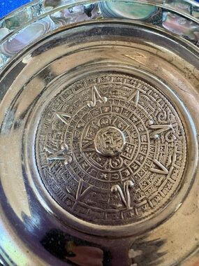 vintage Mexican alpaca silver tray featuring a central embossed